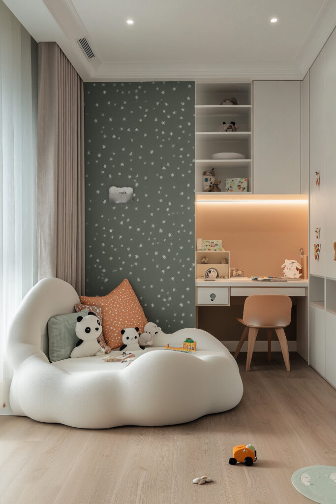 A cozy and dreamy kids bedroom design with cloud-shaped ceiling decorations, soft bedding, and a desk by the window.